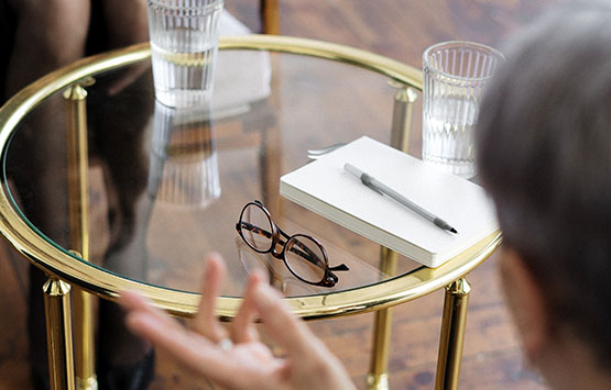 Table with notepad in a meeting
