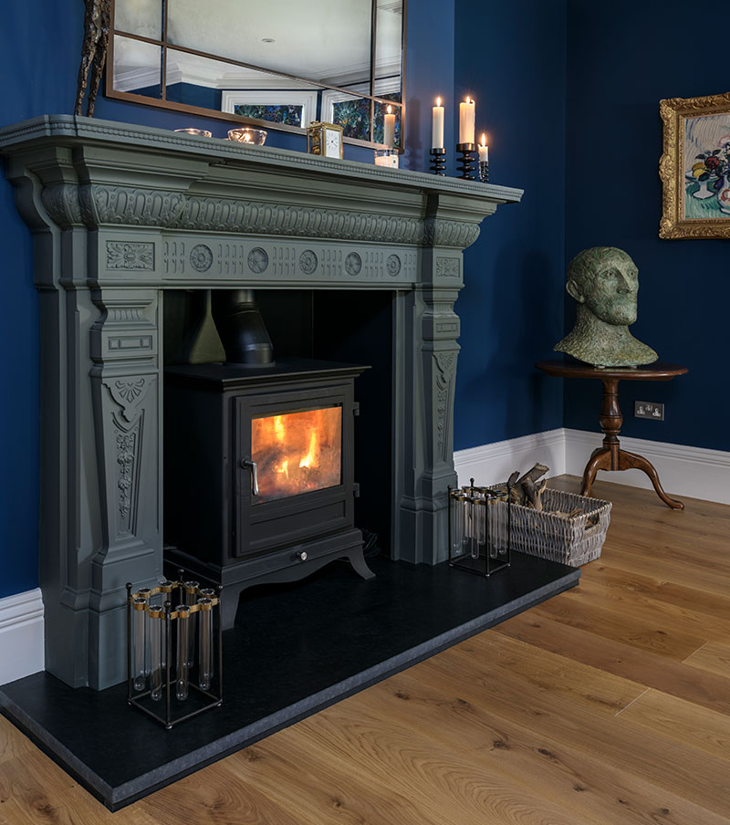 Interior Design Styling Grand fireplace with fire lit