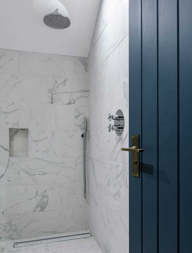 Wet room with blue door