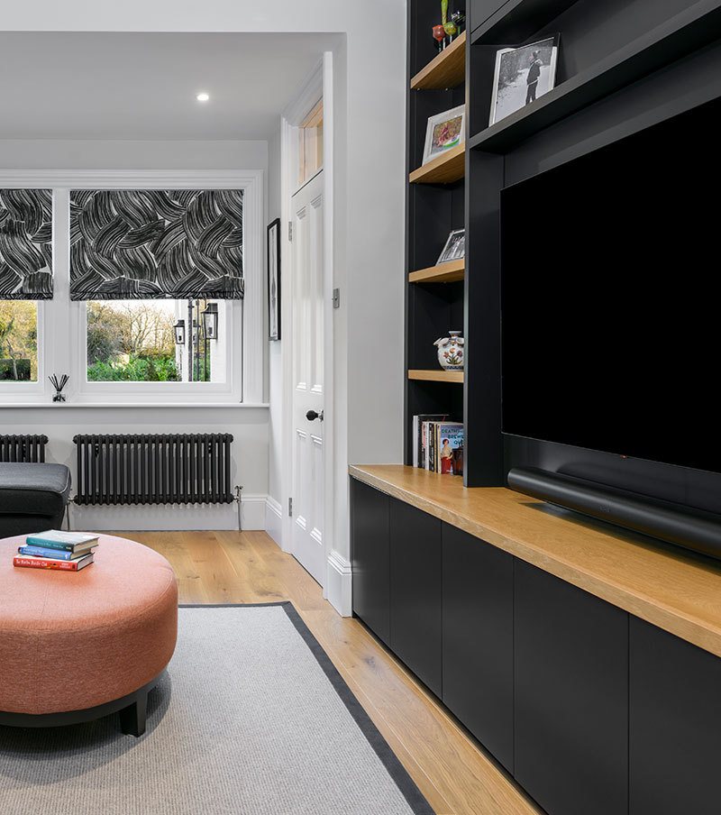 Bespoke joinery example encasing television