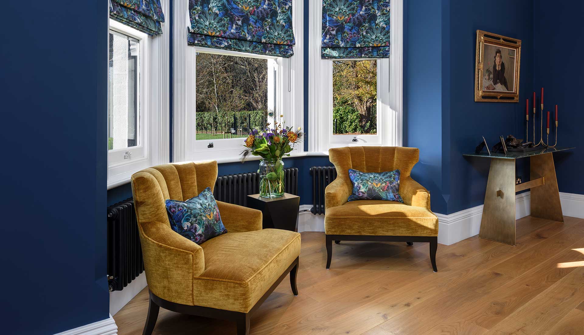 Yellow dining room chairs in front of the window