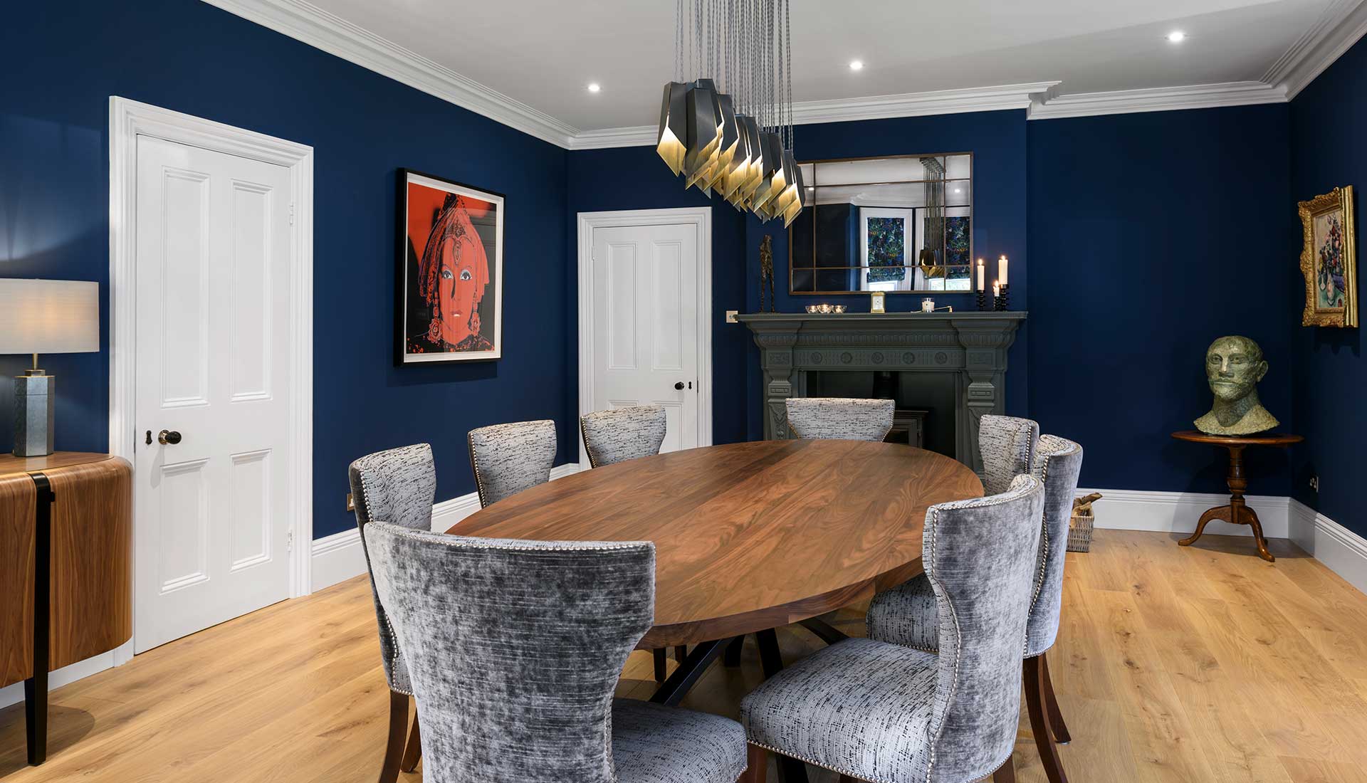 Side view of dining room with large table in the centre