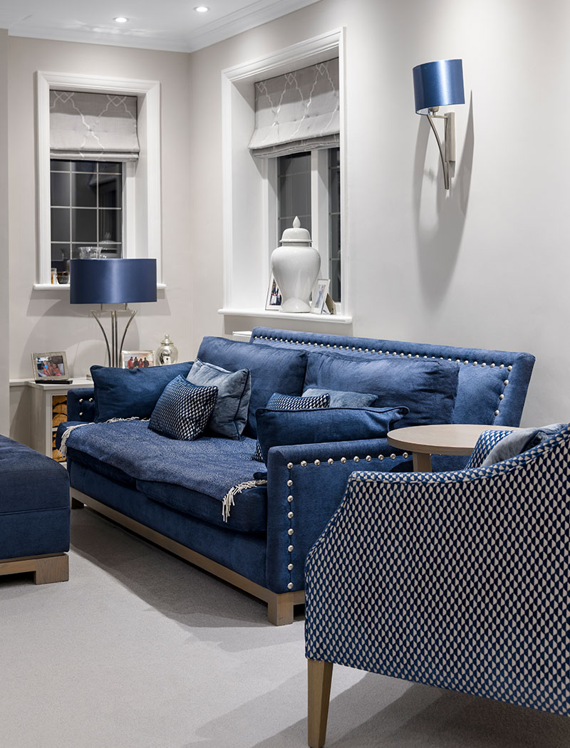 Sonning house living area with blue sofa